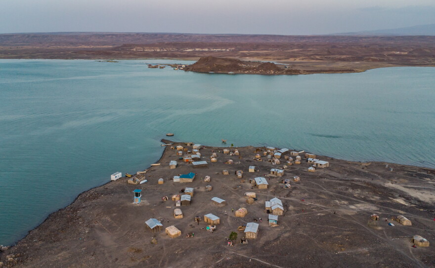 The El Molo village of Komote, which was until recently connected to the mainland, now sits on an island separated by a wide gulf. The community's burial grounds were submerged, along with their drinking water supplies, and families must now pay significant sums of money to have their children transported to school on the mainland by boat.
