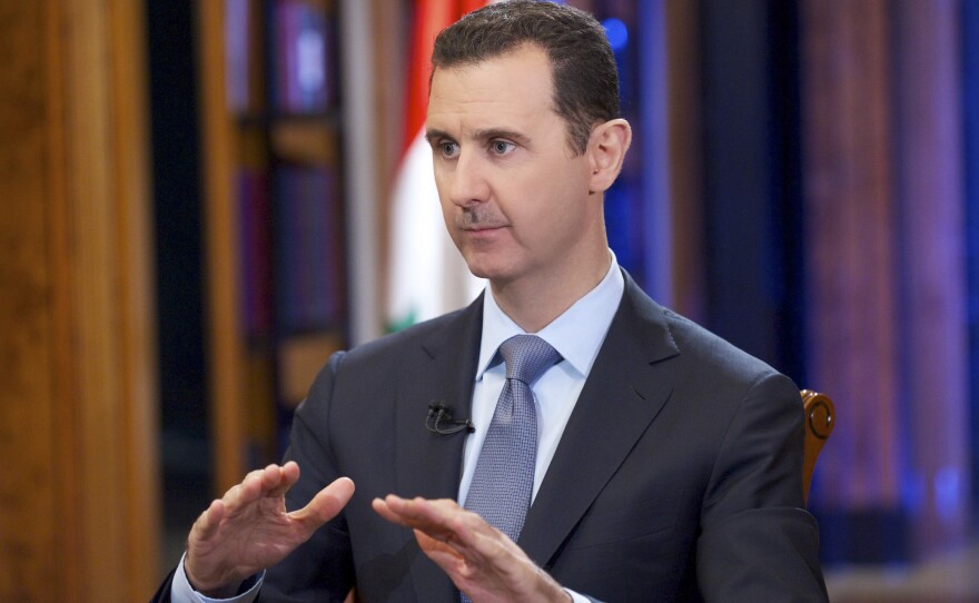 Syrian President Bashar Assad (seen here in September 2013) agreed to relinquish the regime's known chemical weapons and precursor materials after a chemical attack on Ghouta, just outside Damascus, in August 2013 killed hundreds, including children.