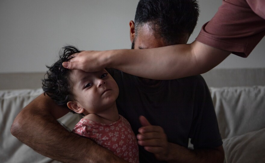 Shaf Amani and his daughter, Yousra, in Alexandria, Va., on Aug. 3, 2023.