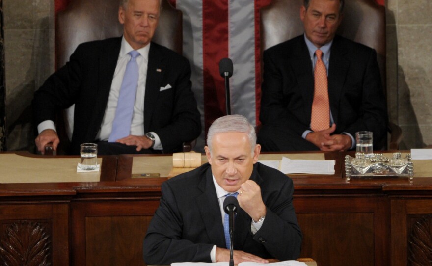 Israeli Prime Minister Benjamin Netanyahu speaks during a joint meeting of Congress on Tuesday. "I'm willing to make painful compromises to achieve this historic peace," he said.