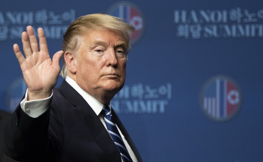 President Trump attends a news conference following his summit meeting with North Korean leader Kim Jong Un on Thursday.