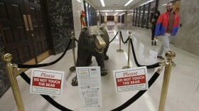 In another coronavirus precaution, California officials cordoned off the sculpture of a bear outside the office of Gov. Gavin Newsom, at the Capitol in Sacramento, Calif., Wednesday, March 11, 2020. 