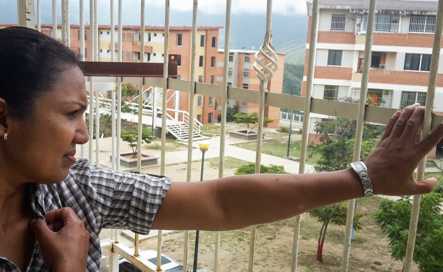 Maria Candelo, whose daughter married John Holt and is now in jail along with him, says she saw police slip weapons into Holt's luggage before the arrests.