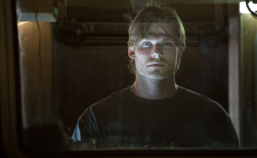 Chris Carmack is the one pretty boy among rednecks in "Shark Night 3D." He also looks like a young Viggo Mortensen. In fact there are also young looking versions of Reese Witherspoon, Tom Green, and Chris Evans in the cast.