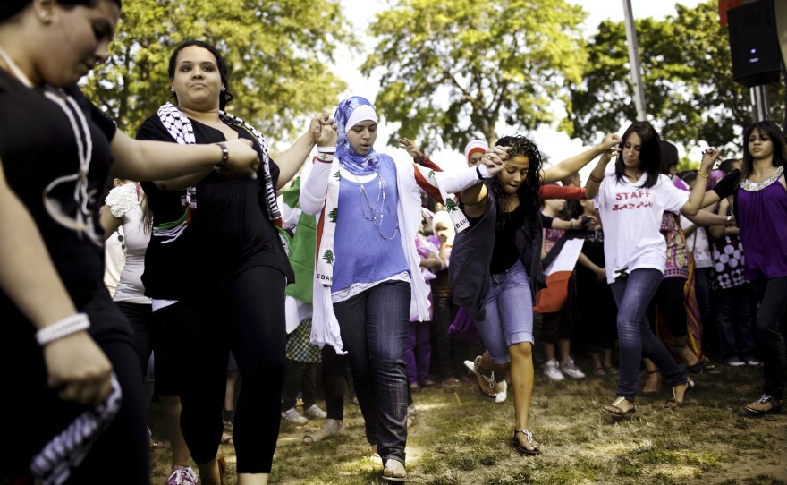 Arab Americans join in a traditional dance during the sixth annual Arab-American Heritage Festival in Brooklyn in 2011.