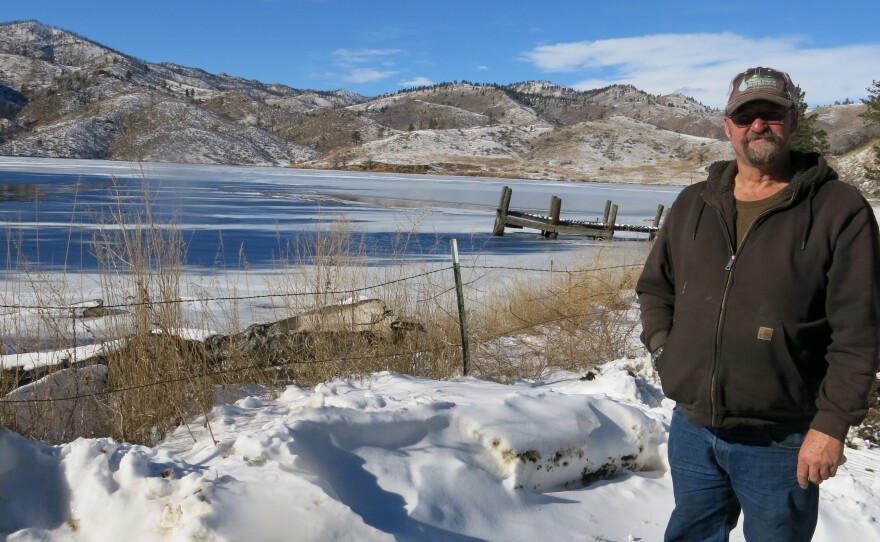 Reservoir caretaker Doug Billingsley stands in his front yard — just yards away from the Milton Seaman Reservoir north of Fort Collins.
