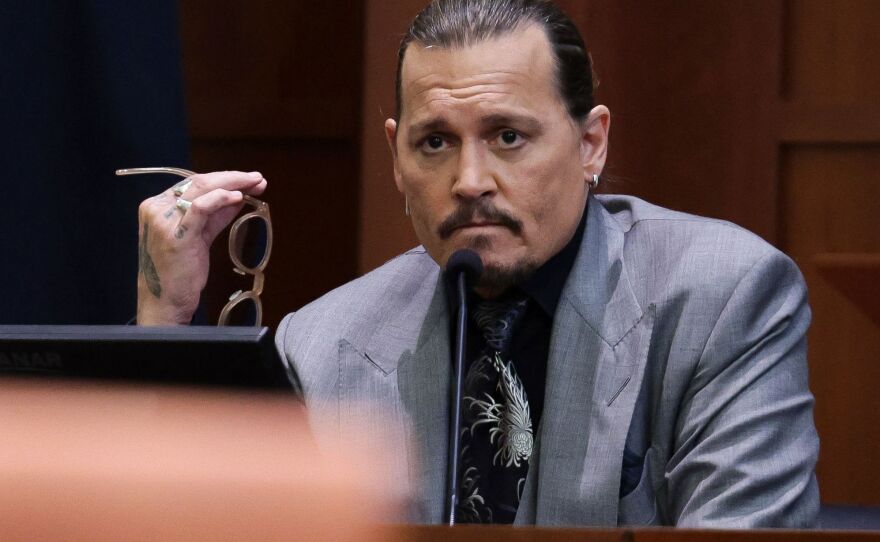 Actor Johnny Depp looks on at the end of the second day of his testimony during the defamation trial against his ex-wife Amber Heard in Fairfax, Virginia on Wednesday.