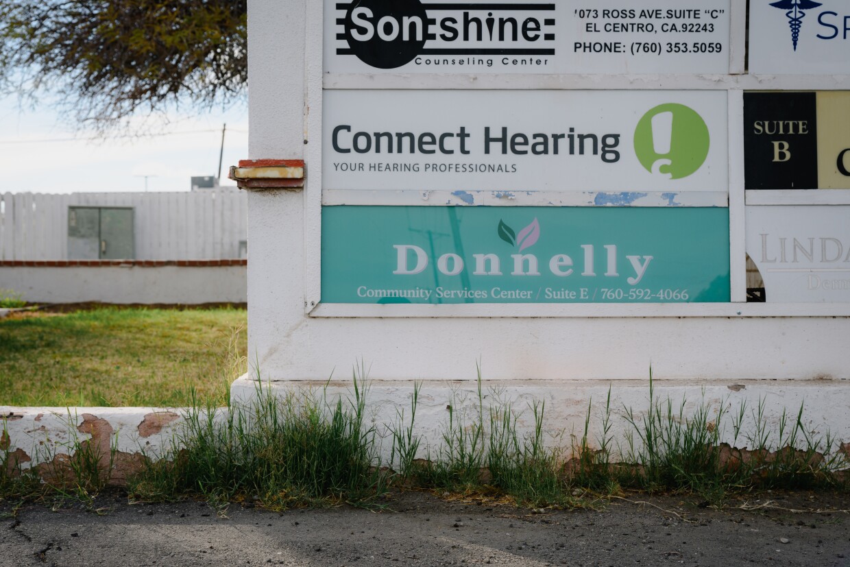 A glassy, ocean-blue sign now welcomes visitors to the Donnelly Community Services Center in El Centro, California. February 7, 2025.