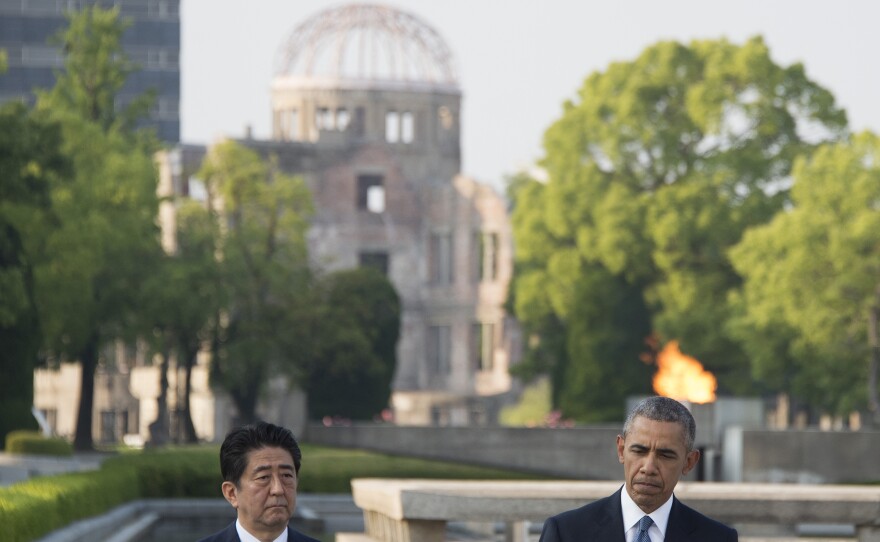 President Obama and Japanese Prime Minister Shinzo Abe deliver remarks at the Hiroshima Peace Memorial Park in Hiroshima on Friday.