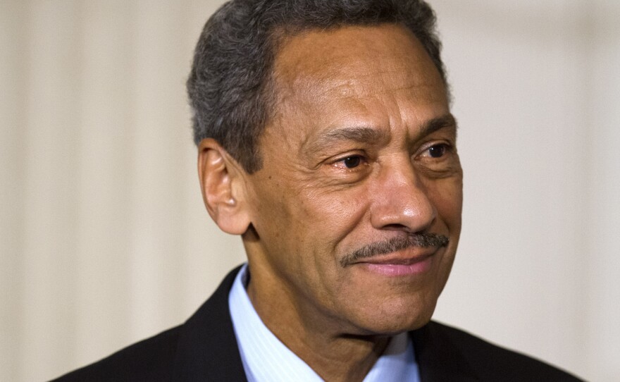 Rep Mel Watt, D-N.C., listens as President Barack Obama announces his nomination to head the FHFA. Watt was first nominated in May, but republicans blocked confirmation until this week.
