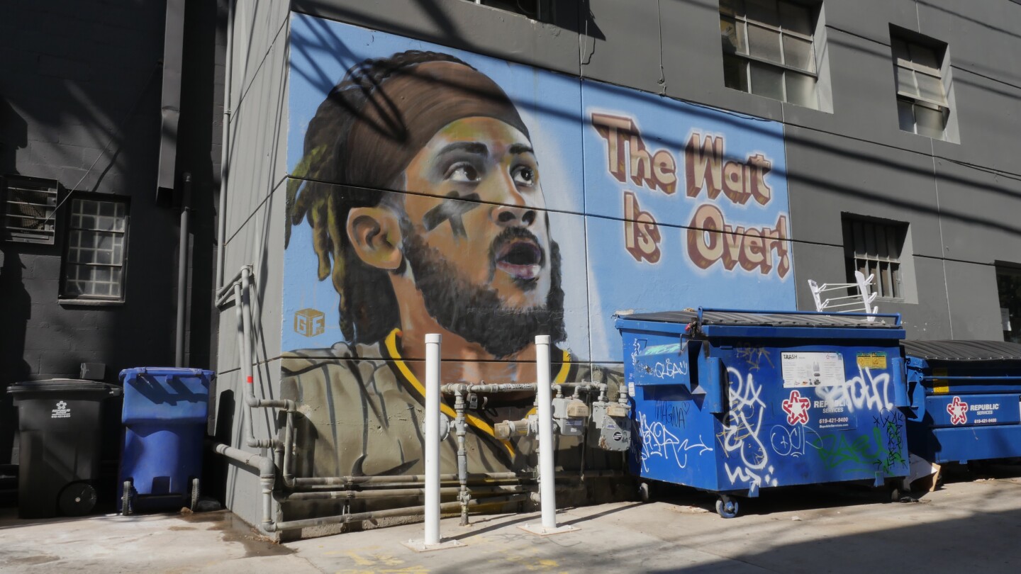 This Ground Floor mural, unveiled in April 2023 behind 3 Punk Ales Brewing Co. in Chula Vista, depicts Fernando Tatis Jr. with the caption “The wait is over!” This message refers to his return to the Padres lineup after missing the entire 2022 season. (Oct. 8, 2024)