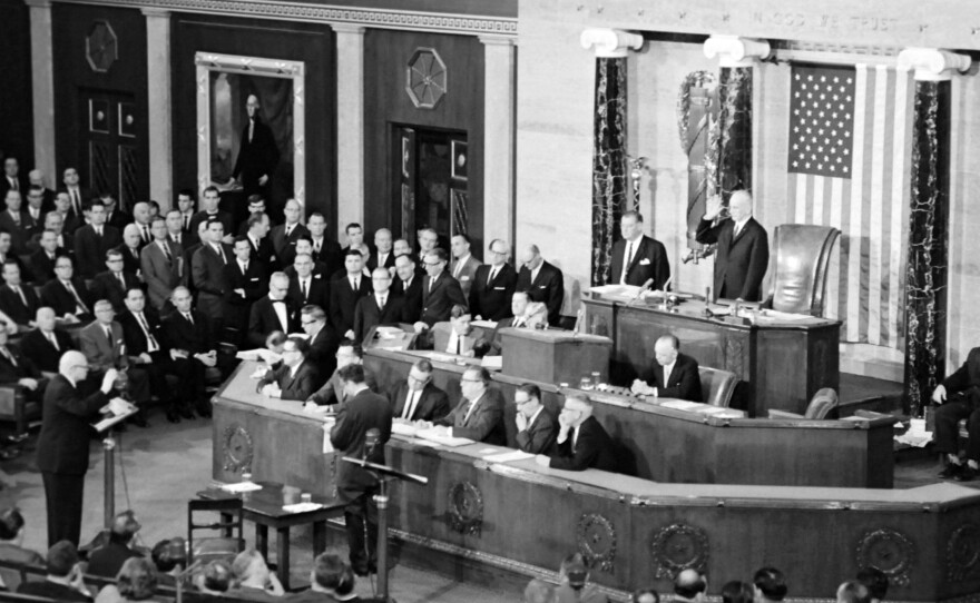 President Lyndon B. Johnson outlines his program and expresses a desire to travel to Europe in his State of the Union address to both houses of the United States Congress meeting in session common at the Capitol on Jan. 7, 1965 in Washington, D.C.