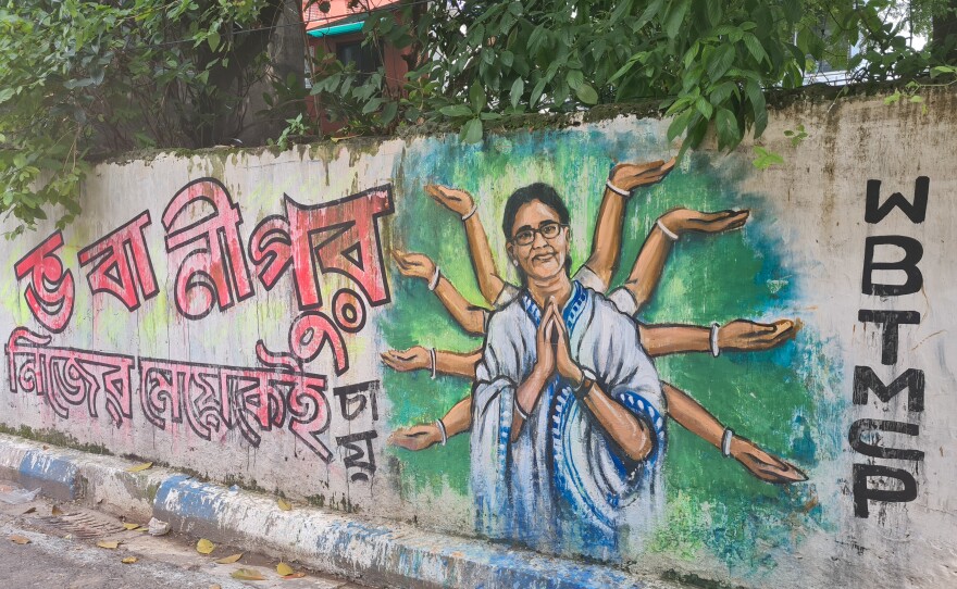 Graffiti in Kolkata depicts West Bengal's Chief Minister Mamata Banerjee as the 10-armed Hindu goddess Durga, ahead of a Hindu festival called Durga Puja celebrating the goddess.