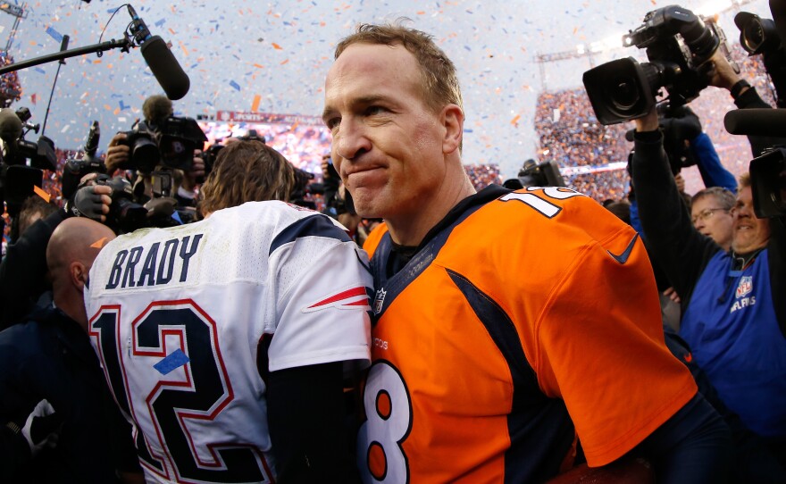 Peyton Manning and Tom Brady speak after the AFC Championship game in Denver on Sunday.