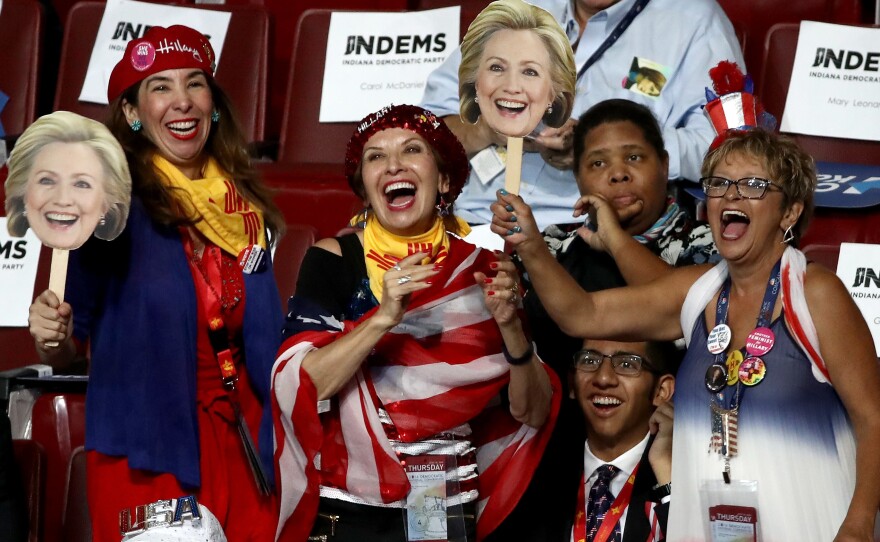Delegates and attendees cheer during the fourth and final day of the Democratic National Convention.