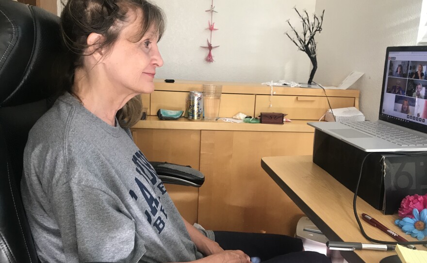 Kimberly pictured above on a Zoom call with Stitch friends.