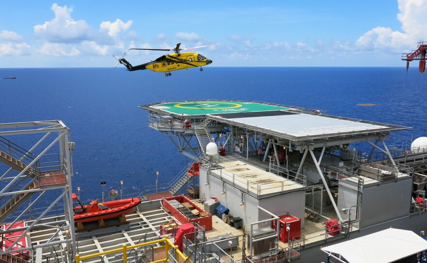 There are 192 crew members aboard the Olympus. Big yellow helicopters transport them for the hour-long ride to and from the platform.