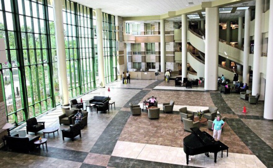 The lobby of the Billings Clinic has an abundance of natural light, and even a piano player, to create a calming, healing ambiance. The center is a top-class health-care facility for cancer treatment.