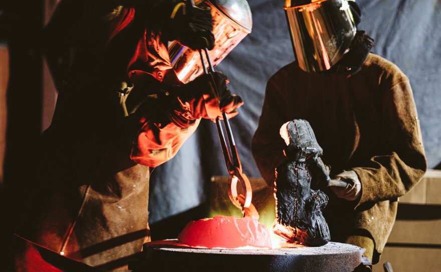 Workers at a foundry heat pieces of the Robert E. Lee statue. It is being melted down and poured into ingots which will later be used to create a new art exhibition in Charlottesville, Va.