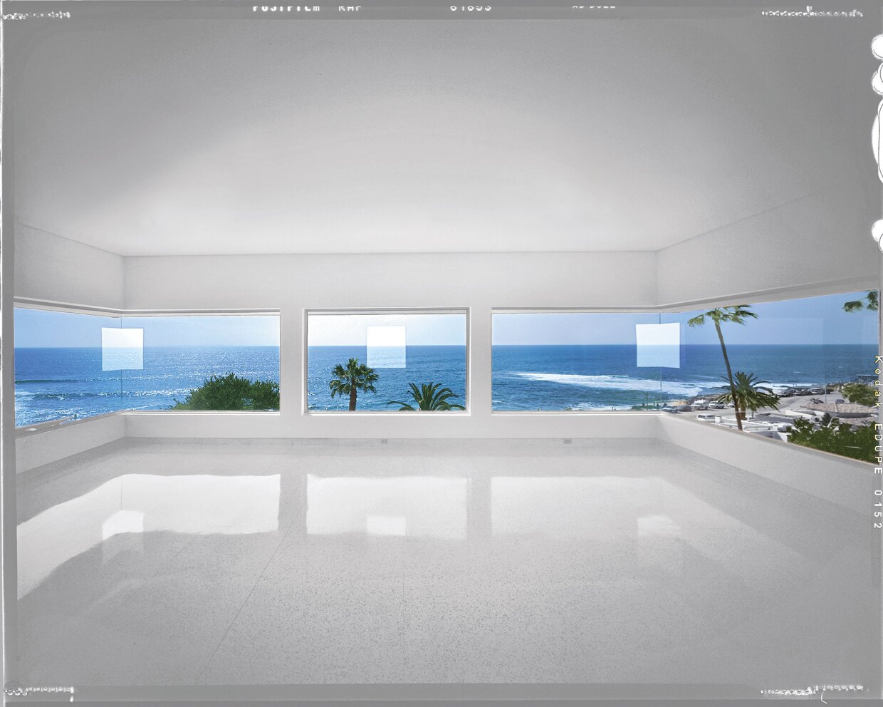 Robert Irwin's 1997 site-specific work "1°2°3°4°" cuts apertures directly into — and through — the windows.