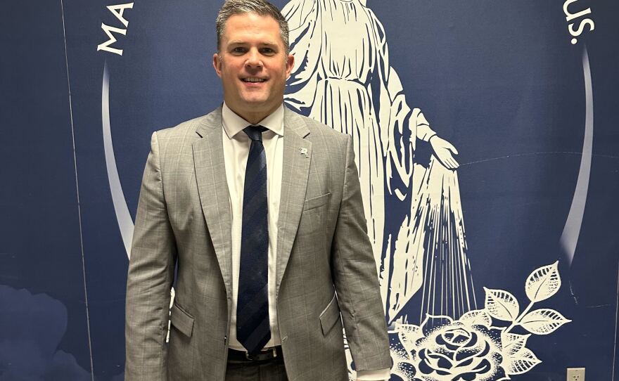 Chris McCarville, president of Xavier Catholic Schools, in the hallway of Xavier High School in Cedar Rapids. He said, at his schools, faith development "should be part of the math curriculum. It should be part of football. It should be part of everything that we do."