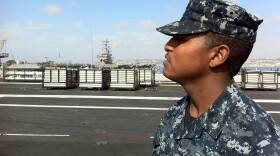 Sailor Richard Steel surveys the deck of the USS Carl Vinson 