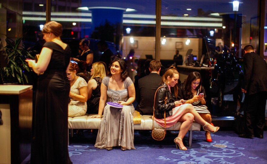 Fans and staff wait for a glimpse of celebrities after in the lobby of the Washington Hilton after the 102nd White House Correspondents' Dinner on Saturday, April 30,2016 in Washington, D.C.