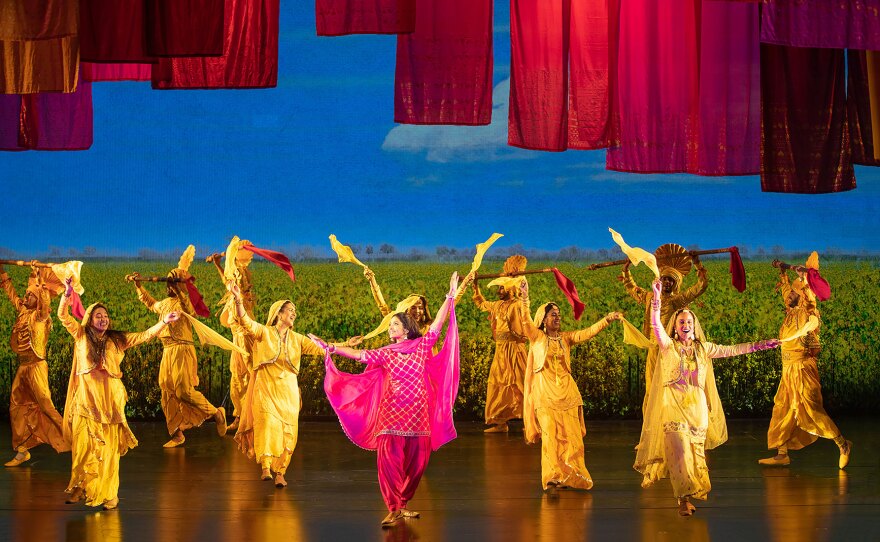 The cast of "Come Fall in Love – The DDLJ Musical," are shown in a 2022 production photo at The Old Globe.