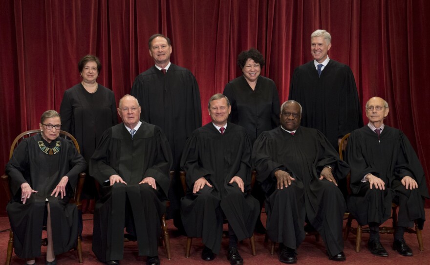Justices of the Supreme Court sit for their official group photo in June 2017. Seated, from left: Ruth Bader Ginsburg, Kennedy, Chief Justice John G. Roberts, Clarence Thomas and Stephen Breyer. Standing: Elena Kagan, Samuel Alito Jr., Sonia Sotomayor and Neil Gorsuch.