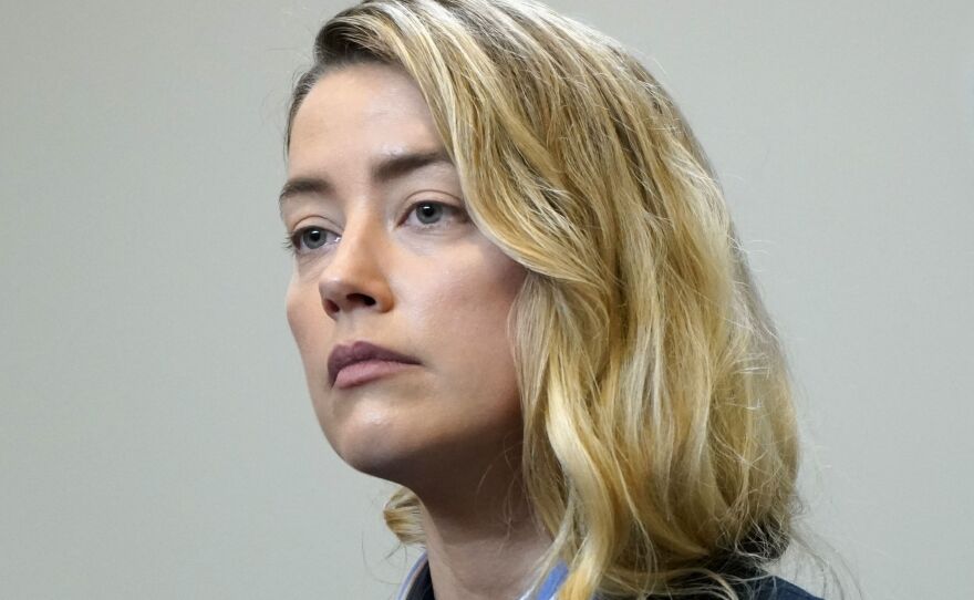 US actress Amber Heard returns to the courtroom after a lunch break at the Fairfax County Circuit Court in Virginia on Wednesday.