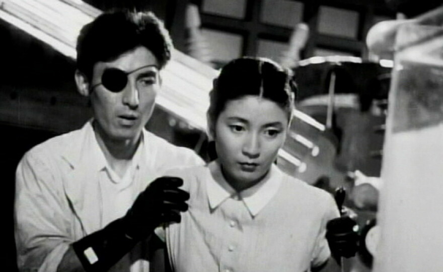 Akihiko Hirata as Dr. Serizawa and Momoko Kôchi as Emiko in 1954's "Godzilla," the film was released as a badly recut and badly dubbed American version known as "Godzilla, King of the Monsters."