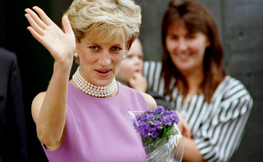 FILE - Diana, Princess of Wales waves to the crowd as she leaves the Victor Chang Cardiac Research Institute in Sydney Australia, Friday, Nov. 1, 1996.