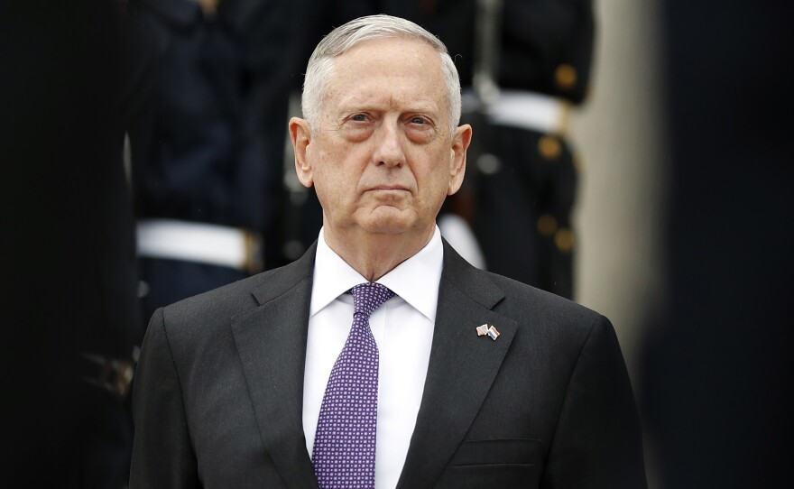 Defense Secretary Jim Mattis will maintain current policy on transgender service members, promising to convene a panel to study how to implement President Trump's ban on transgender troops.