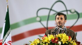 In this photo from April 2007, Iranian President Mahmoud Ahmadinejad delivers a speech during a visit to the Natanz uranium enrichment facility about 200 miles south of Tehran, the country's capital. During the speech, Ahmadinejad announced that Iran was producing enriched uranium on an industrial scale, warning that the Islamic republic would defend its nuclear rights "to the end."