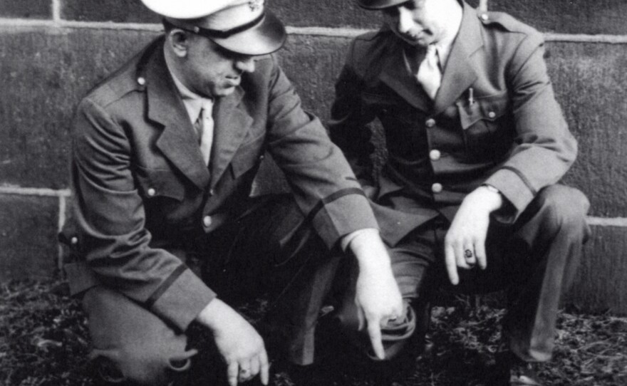 Guards inspect a tunnel that inmate Willie Sutton and 11 others tried to use in a doomed escape in 1945.