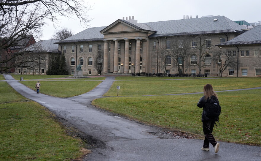 People walk on the campus of Cornell University in Ithaca, N.Y., in 2024.