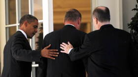 President Obama holds the Oval Office door for outgoing National Security Adviser James Jones (center) and Jones' replacement, Tom Donilon, on Oct. 8.