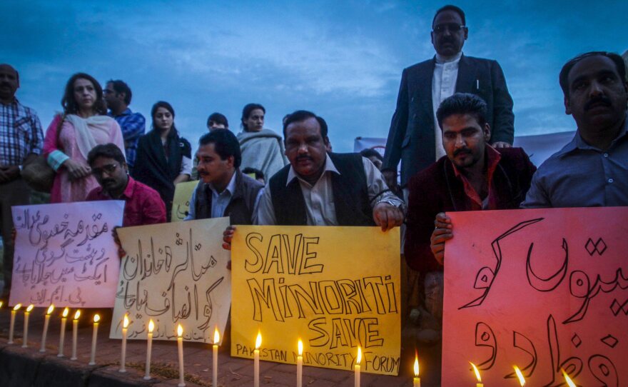 Pakistani activists and members of the Christian minority light candles to protest the killing of a Christian couple who were burned alive after being accused of blasphemy. The protest took place in the capital Islamabad on Wednesday.