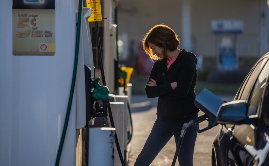 A person is pumping gas in Houston on April 1. Gas prices have risen further after Russia's invasion of Ukraine upended energy markets.