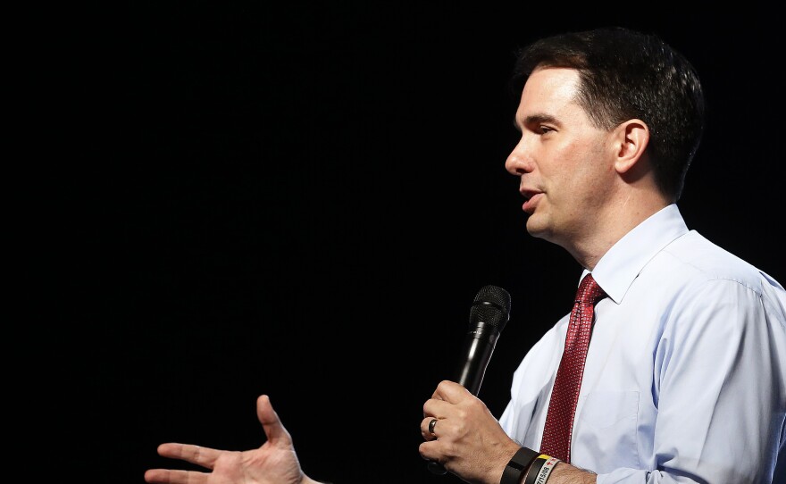 Wisconsin Gov. Scott Walker speaks at the Western Conservative Summit, hosted by the Centennial Institute, Colorado Christian University's think tank, in Denver, last month. Walker is announcing a run for the White House, joining more than a dozen Republicans to enter the 2016 contest.