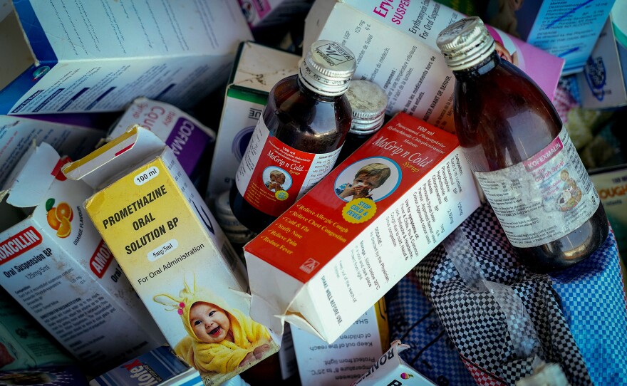 A photograph shows collected cough syrups in Banjul on October 06, 2022.