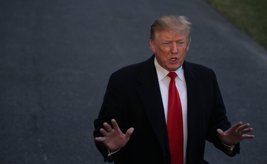 President Trump speaks to reporters Sunday as he returns to the White House after spending the weekend in Florida. He reacted to special counsel Robert Mueller's concluded investigation.