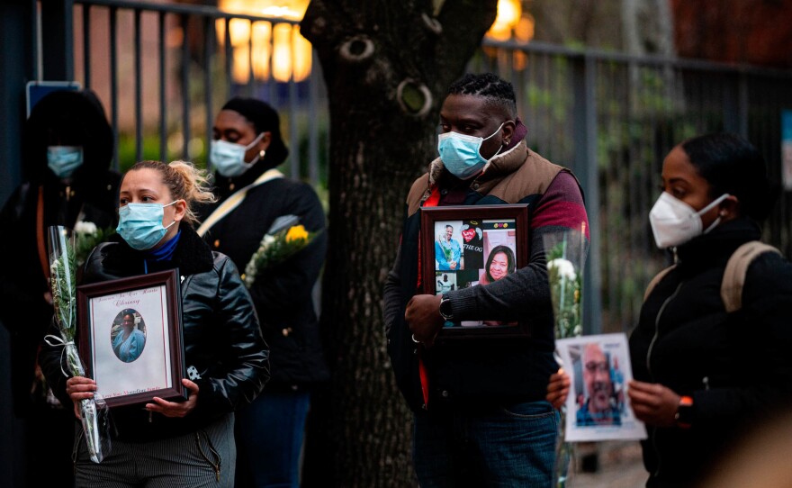 Nurses and health care workers outside Mount Sinai Hospital in New York City remember their colleagues who died during the first wave of the coronavirus outbreak in April 2020.