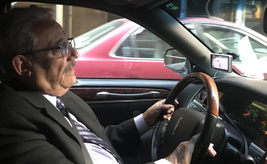 Houchang Golzari drives a Town Car for a service in New York City. He says the Black Car Fund compensated him for some of his lost wages after he was involved in an accident.