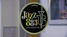 The logo of KSDS Jazz 88.3 is shown on a glass station door on August 5, 2025.