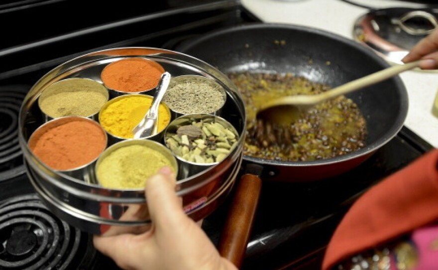 Jasjit Kaur Singh, an Indian chef, cooks kaala channa, a traditional spicy Sikh dish. A psychologist says that children who grow up in cultures with lots of spicy food are taught to like spice early on.
