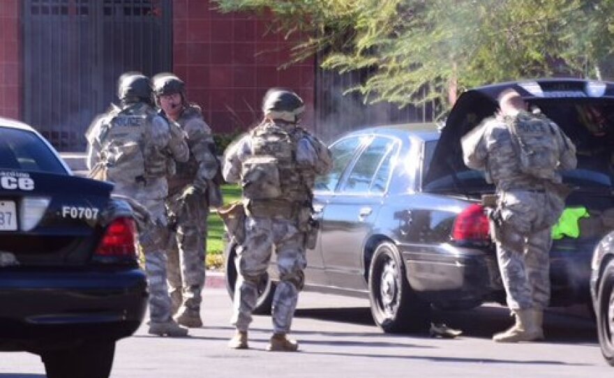 A SWAT team arrives at the scene of a shooting in San Bernardino at a social services facility, Dec. 2, 2015.