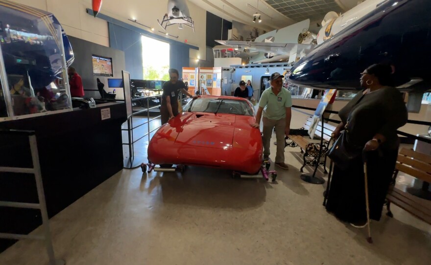 The Avion car is shown being wheeled back to its display space in the San Diego Air & Space Museum on Nov. 3, 2023.