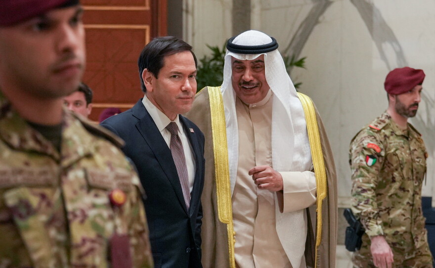 U.S. Secretary of State Marco Rubio and Kuwait's Crown Prince Sheikh Sabah Khaled Al-Hamad Al-Sabah share a word on the occasion of their meeting at Bayan Palace during Rubio's visit to the Middle East to discuss the interim deal between the U.S. and Iran with Arab Gulf allies, in Kuwait City, Kuwait, Wednesday.