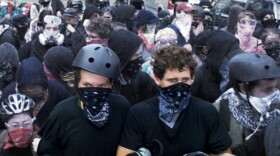 Brad Crowder and David McKay protest at the 2008 Republican National Convention before their arrests on domestic terrorism charges.